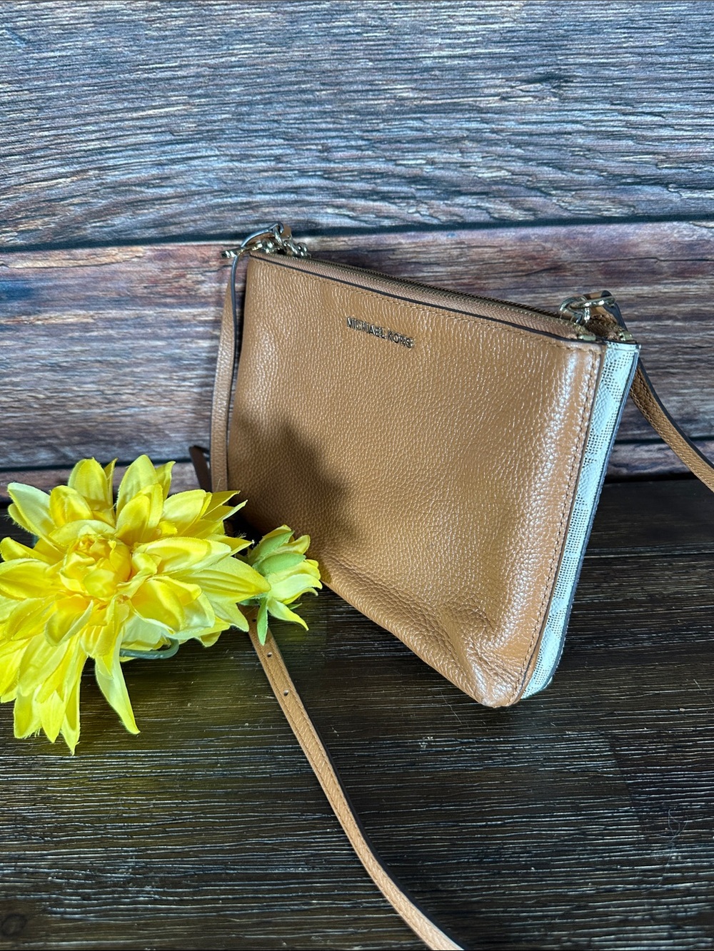 Michael Kors Trisha medium crossbody bag features a two-tone design!